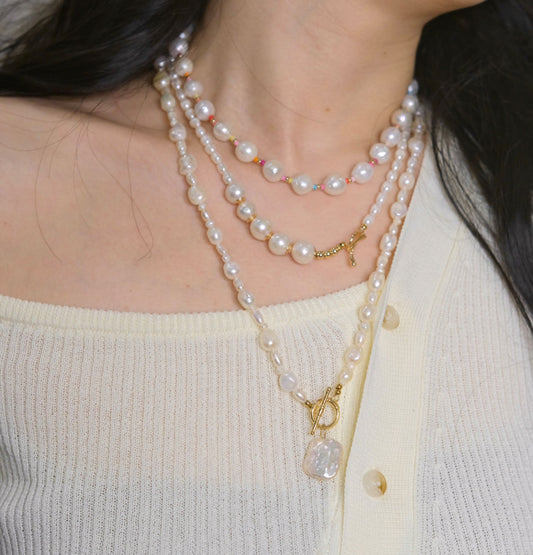 Long pearls necklace with Baroque pearl pendant