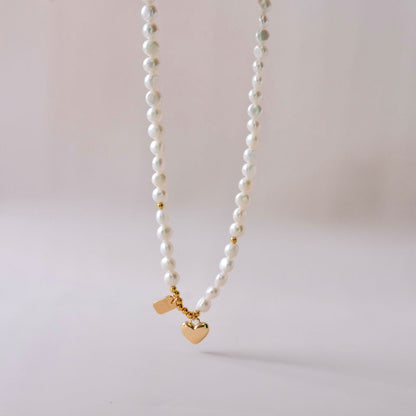 pearls necklace with heart and letter charms