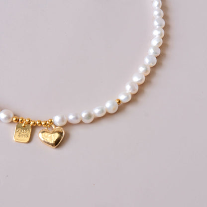 pearls necklace with heart and letter charms