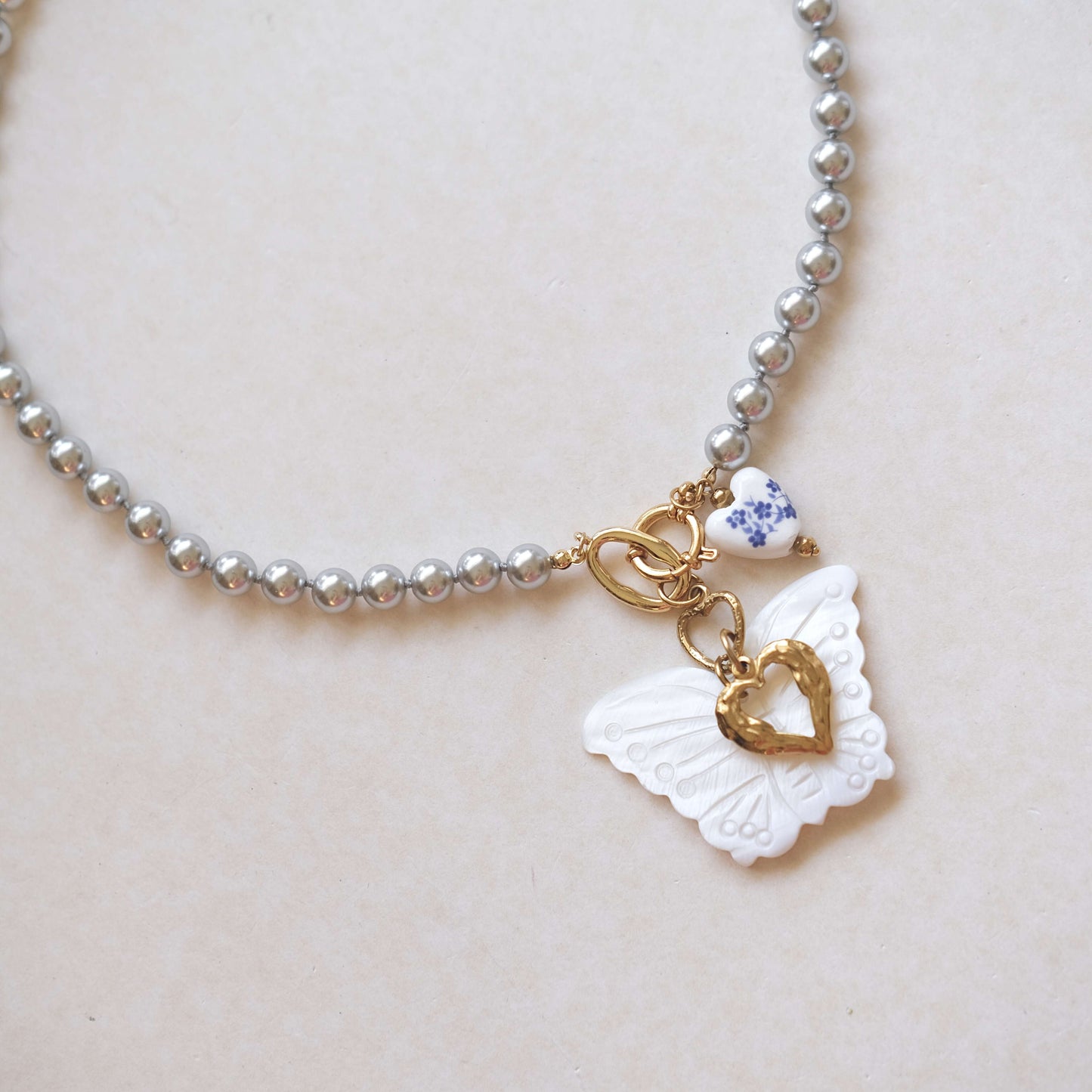 Butterfly Pearl Necklace with Heart Charm - Elegant White & Gold Pendant