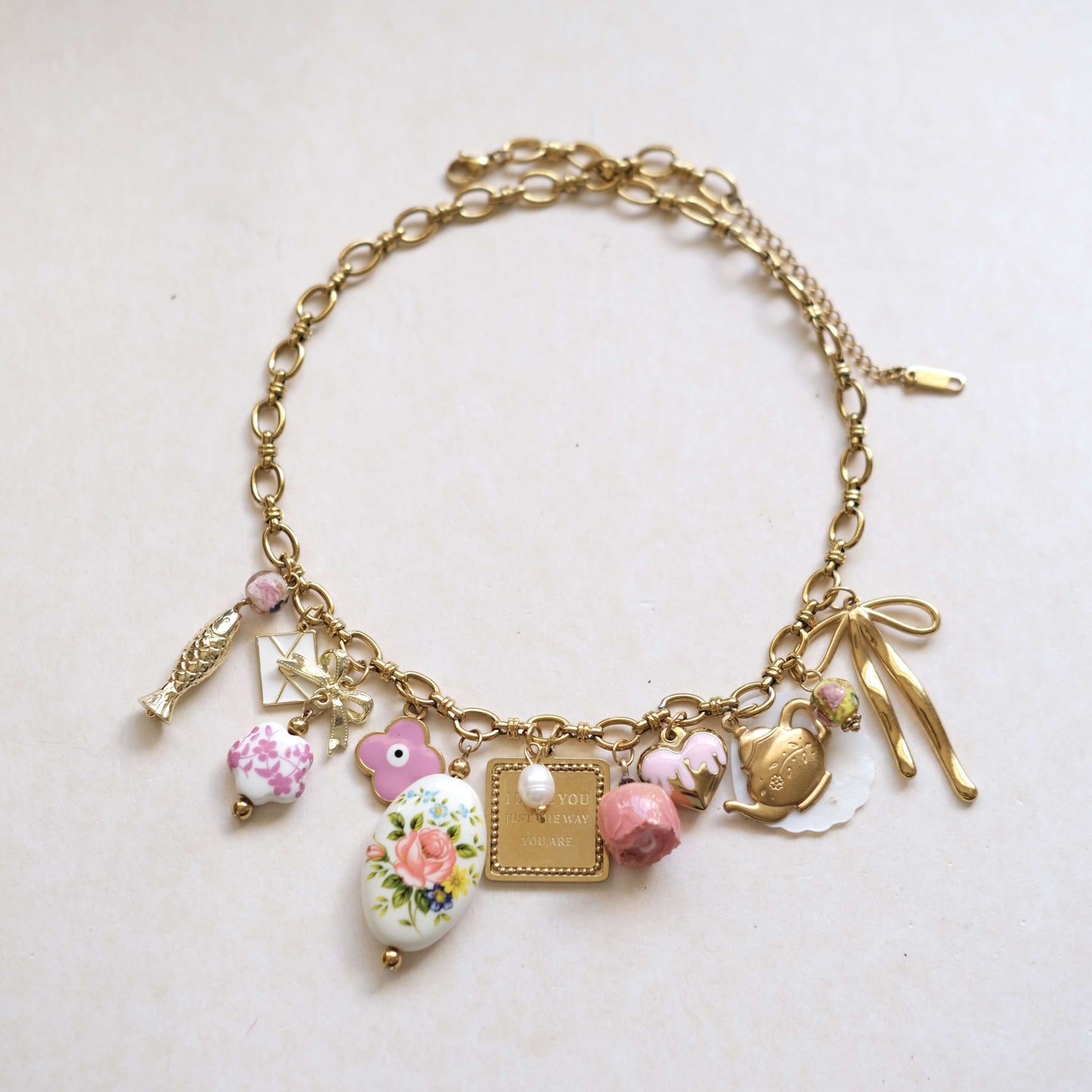 Vintage Charm Necklace - Gold Chain with Floral, Fish & Tea Accents