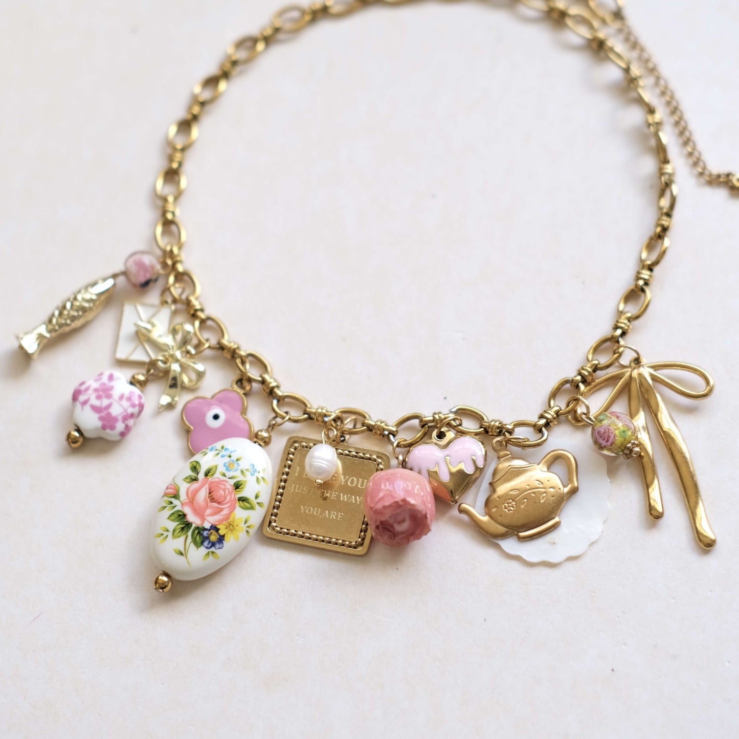 Vintage Charm Necklace - Gold Chain with Floral, Fish & Tea Accents